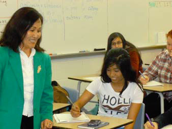 Fort Collins High School sophomore, Margarita Gutierrez, and visiting author, Maija Rhee Devine.